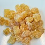 crystallised ginger cubes with caster sugar